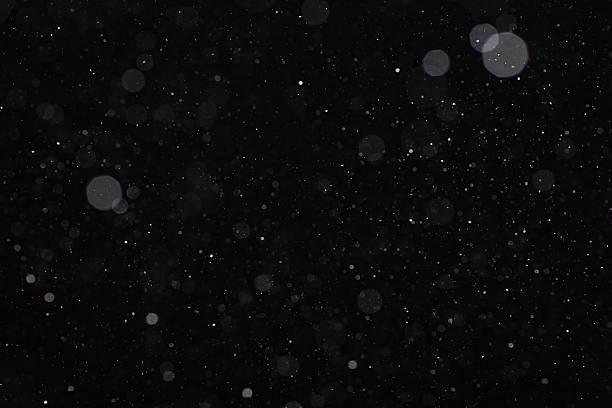 Abstract black white snow texture on black background for overlay