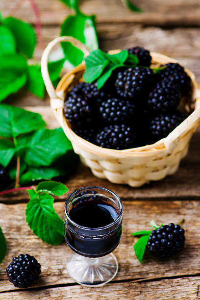 istock liqueur from blackberry in a shot glass 487351738