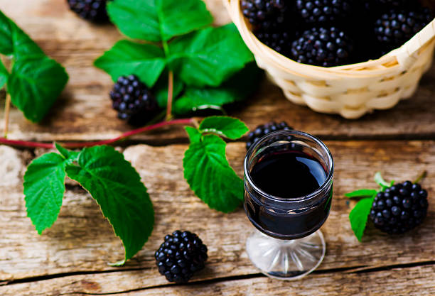 istock liqueur from blackberry in a shot glass 487351740