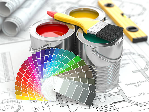 istock Construction. Cans of paint with colour palette and paintbrush. 487357563