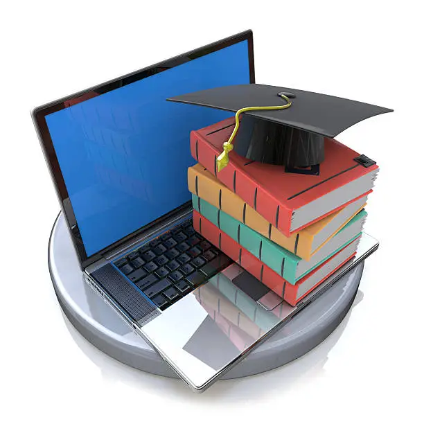 Photo of Books and graduation cap on laptop- e-learning 3d concept