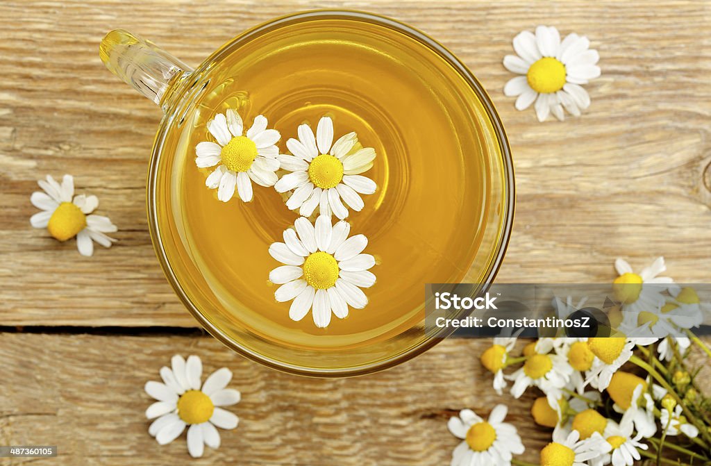 chamomile tea top view of cup of chamomile tea with chamomile flowers Blossom Stock Photo