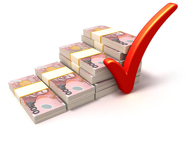 istock New Zealand dollars and check mark 487360297