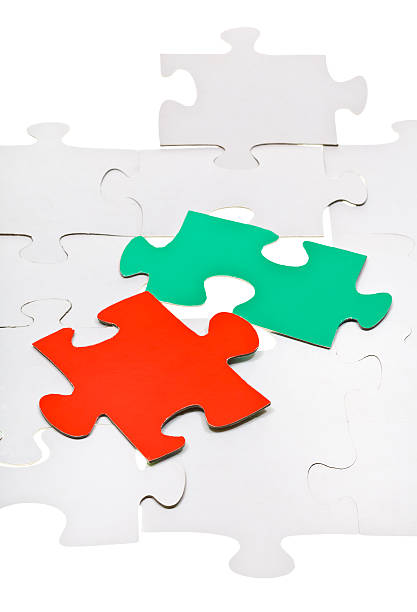 istock red piece on free space of connected puzzles 487361193