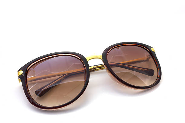 istock Brown sunglasses on isolated white background 487361199