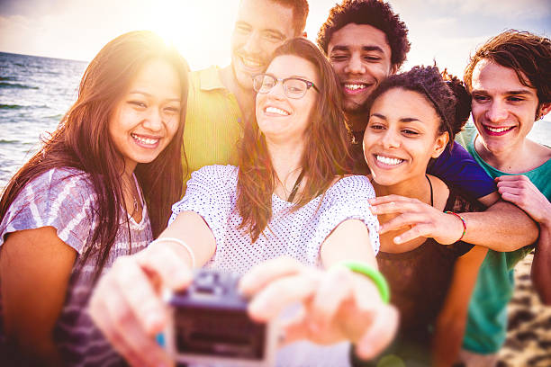 istock Friends self portrait on the beach 487361889