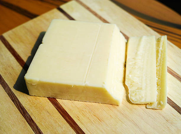 block of cheese stock photo