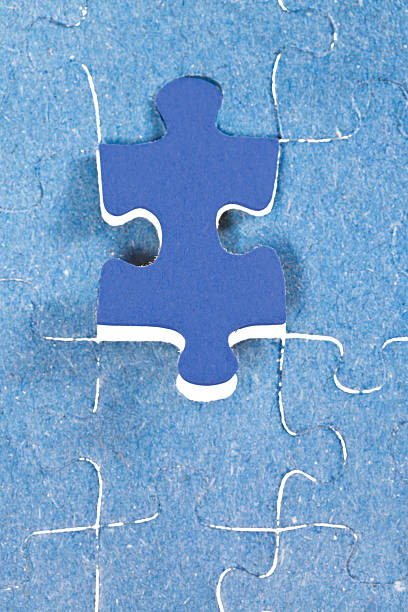 istock setting the last blue piece of puzzle 487363253