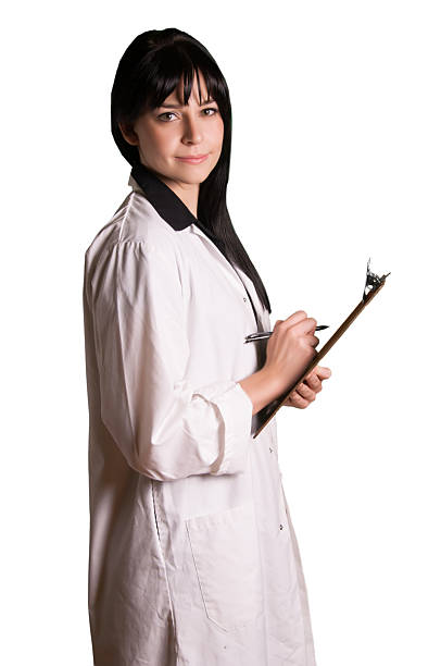 istock Beautiful black hair doctor in white coverall smiling taking notes 487370968