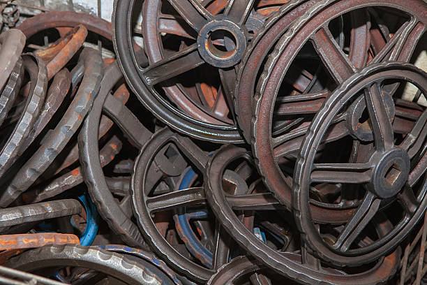 istock Steel rusted hand wheels in warehouse 487371266