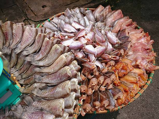 istock Dried fish sale on fish market 487375658