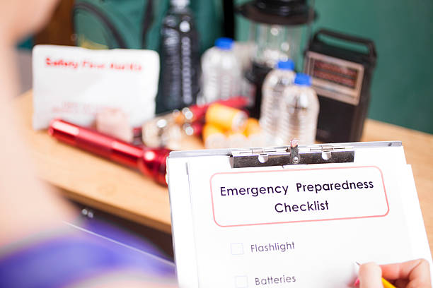 istock Emergency preparedness checklist and natural disaster supplies. 487378968
