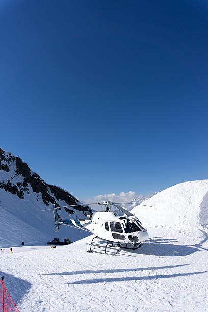 istock White rescue helicopter parked in the mountains 487379314