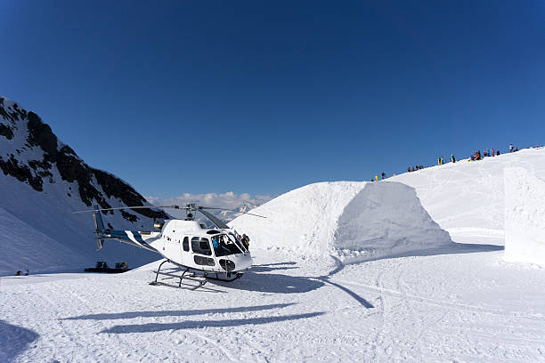 istock White rescue helicopter parked in the mountains 487379378