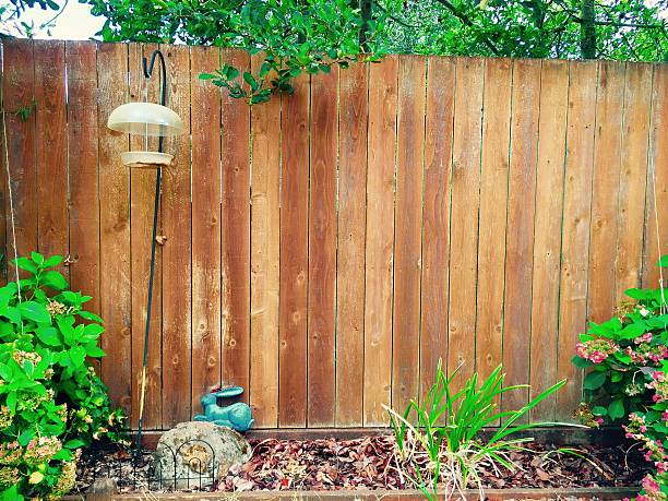 fence with flower pots