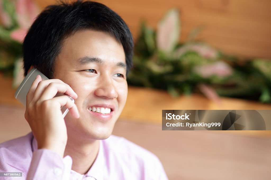 Businessman is using smartphone Businessman is using smartphone, asian 2015 Stock Photo