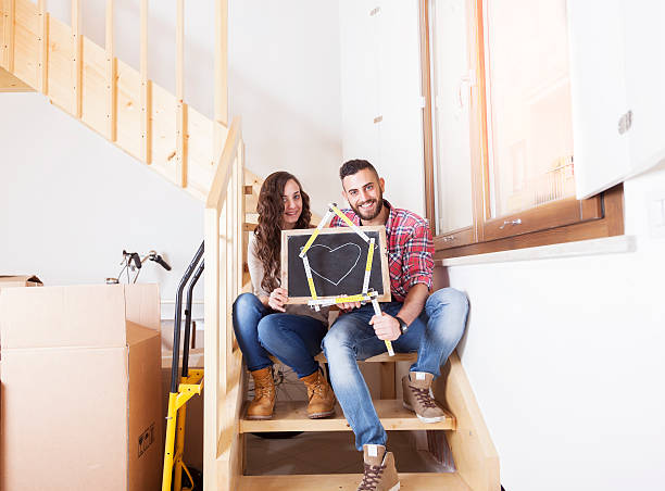 istock young couple moves into new home 487383552