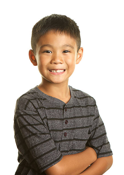istock Handsome Filipino Boy Smiling on White Background 487386626