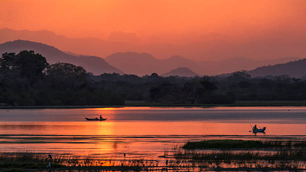 istock Fisherman in Arugam bay lagoon sunset, Sri Lanka 487387084
