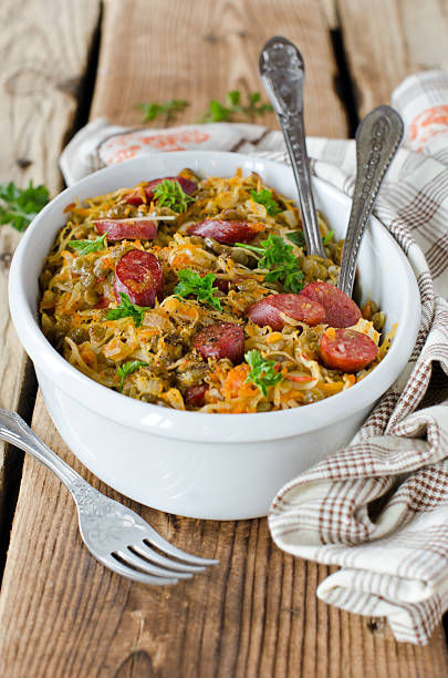 istock Cabbage stew with lentils and sausages 487387443