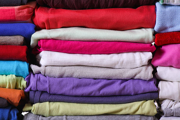 istock Pile of colorful clothes 487387755