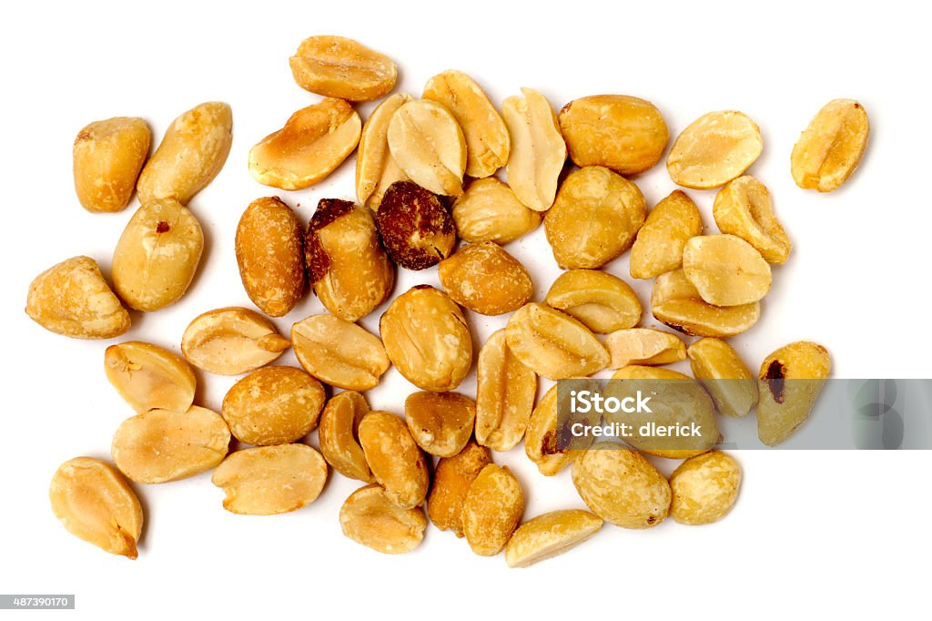 Peanuts Isolated on White Roasted and salted peanuts isolated on white background. Peanut - Food Stock Photo