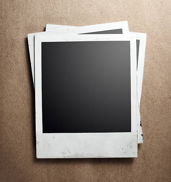 istock Old instant photos on old paper 487393739