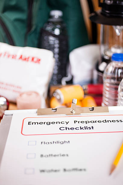 istock Emergency preparedness checklist and natural disaster supplies. 487394158