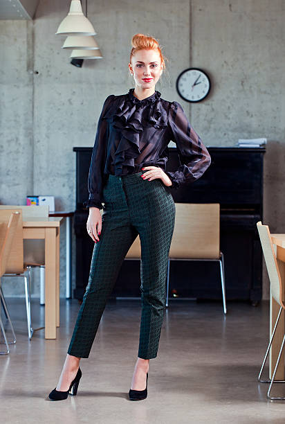 istock young beautiful woman in  black blouse 487394229