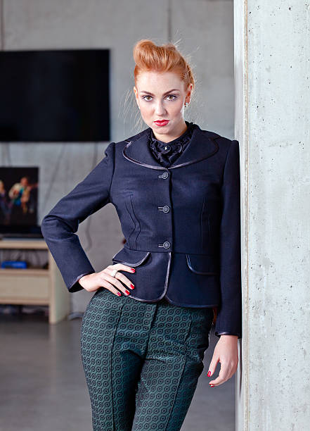 istock young beautiful woman in  black jacket 487394233