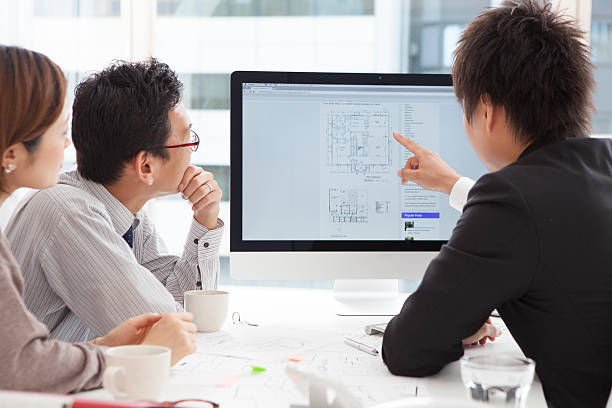 istock Real-estate agent shows a build project 487395020