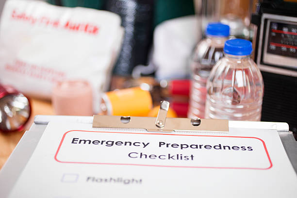 istock Emergency preparedness checklist and natural disaster supplies. 487398342