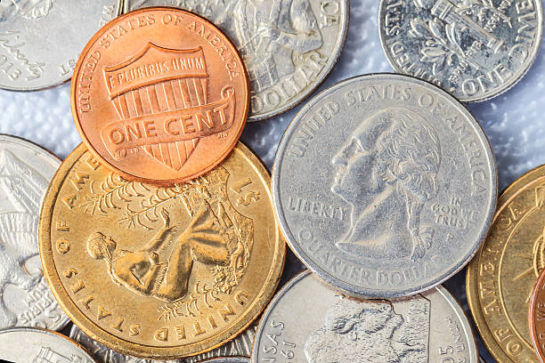 istock Group of US American coins and one cent on top 487399086