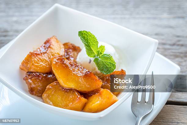 Caramelized Peaches With Vanilla Ice Cream Stock Photo - Download Image Now - 2015, Backgrounds, Beige