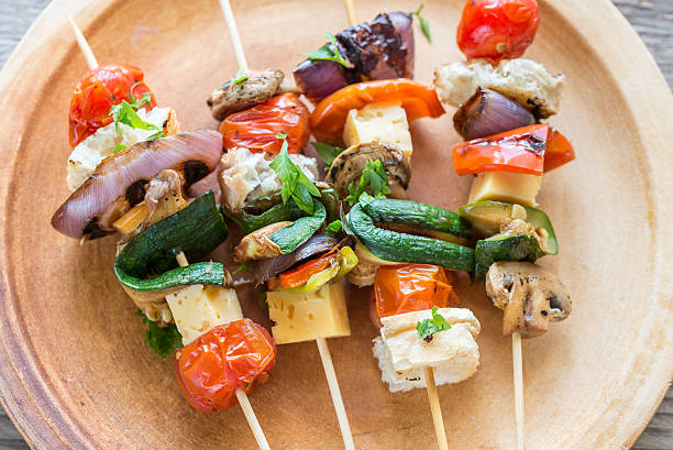 istock Grilled vegetable skewers on the plate 487401956
