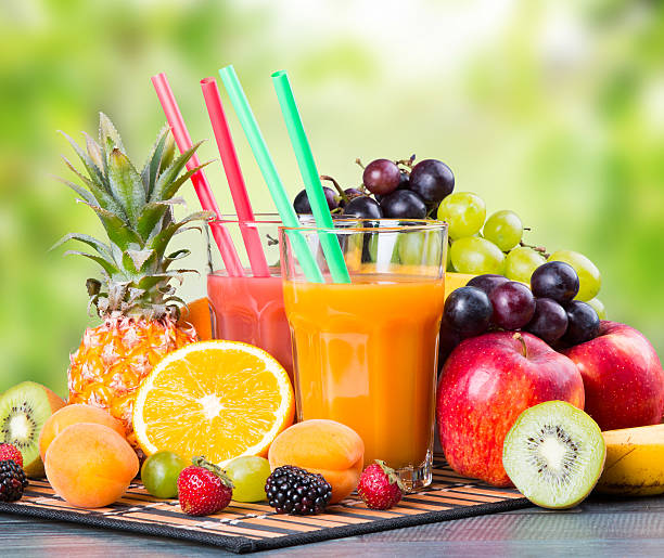 絞りたてのジュース - tropical fruit ストックフォトと画像