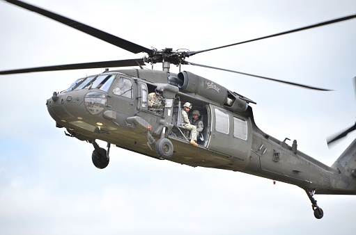 Ft. Carson, CO, USA- June 7, 2014: The Colorado National Guard in partnership with Fort Carson conducted a (CALFEX) combined-arms live-fire exercise and public demonstration at Fort Carson. Blackhawk helicopter with flight chief coming in for a landing. 