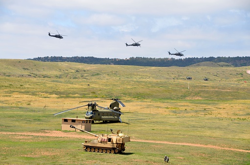 Ft. Carson, CO, USA - June 7, 2014: The Colorado National Guard in partnership with Fort Carson conducted a (CALFEX) combined-arms live-fire exercise and public demonstration at Fort Carson.Helicopters getting ready to attack. 