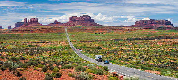 istock Cars on Road to Monument Valley 487407048