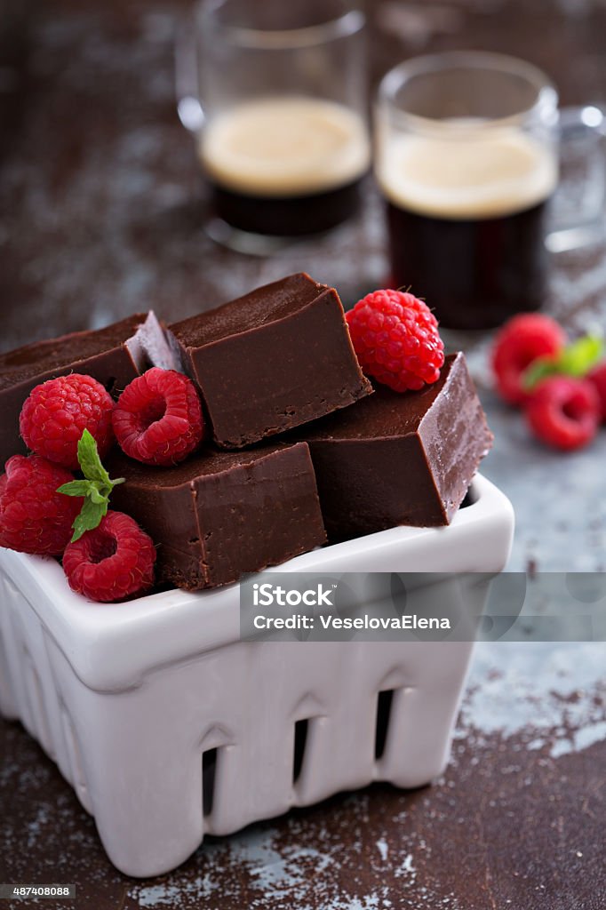 Chocolate fudge pieces Chocolate fudge pieces with rasbberries homemade and delicious 2015 Stock Photo