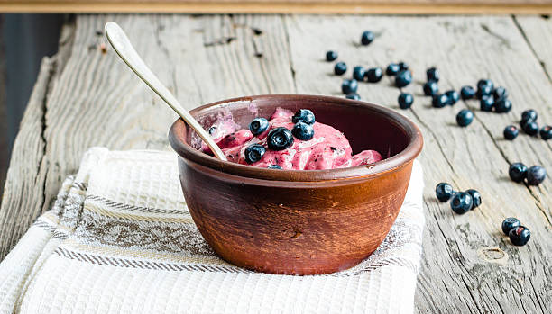 banana ice cream with blueberries, healthy dessert, vegan stock photo