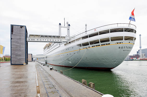Rotterdam, The Netherlands - April 6, 2014: The former cruiseship SS Rotterdam, once owned by the Holland-Amerika Line, has been converted into a hotel that's permanently moored at the 3e Katendrechtse Hoofd in the Katendrecht quarter in Rotterdam.