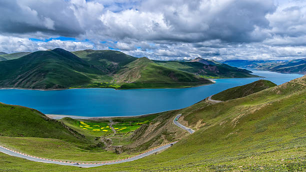 Panoromic View of Yamzho Yumco Lake in a Cloudy Day stock photo