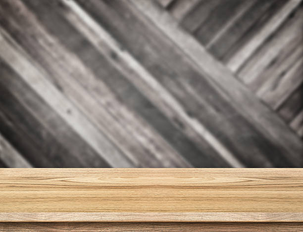 istock wood table at blurred dark tropical plank wooden wall 487408556
