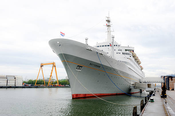 Rotterdam, The Netherlands - April 6, 2014: The former cruiseship SS Rotterdam, once owned by the Holland-Amerika Line, has been converted into a hotel that's permanently moored at the 3e Katendrechtse Hoofd in the Katendrecht quarter in Rotterdam.