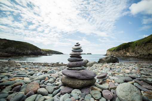 Piled-up stones on the beach with copy space