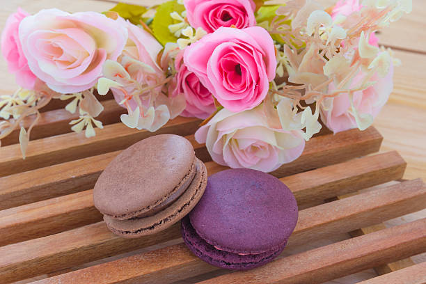 istock Colorful French Macarons On wood panel 487410742