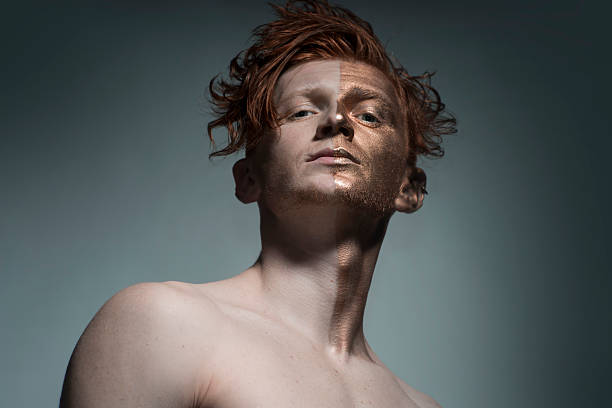 istock Stylish man with bronze face 487411354