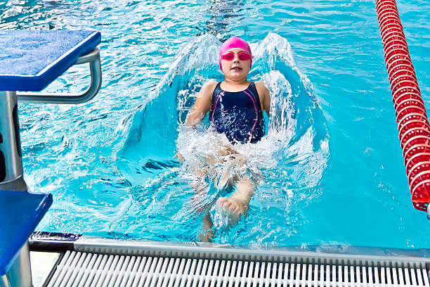 istock Girl in pink rubber hat 487411686