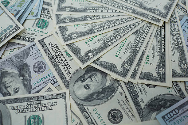 istock banknotes to two and one hundred USD 487417502